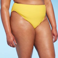 Cheeky bikini bottom from Wild Fable™ in solid yellow tailored in a flattering high-waist, extra high-leg silhouette. Made from soft fabric with spandex and full lining for stretchy comfort and coverage. Pull-on style makes it easy to put on and take off. If you're not satisfied with any Target Owned Brand item, return it within one year with a receipt for an exchange or a refund. Wild Fable™: A look for every story. Solid High-cut Leg Bottoms For Beach Season, High Waist Yellow Beachwear Bottoms, High Waist Yellow Bottoms For Poolside, Yellow Bottoms For Pool, Yellow High Waist Stretch Swimwear, High Waist Yellow Beach Bottoms, Yellow Brief Bottoms For Pool, Yellow Pool Brief Bottoms, High Waist Yellow Bottoms For Beach