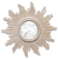 a mirror that is in the shape of a sun