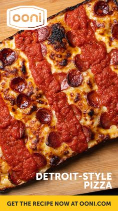 a large pepperoni pizza on a wooden cutting board