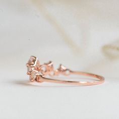 A romantic and feminine princess ring with delicate details, perfect gift for your little princess! Stone: Nature white Topaz in 4mm & 2.2mm. Bandwidth: 1.1mm Metal: 14k rose gold plated sterling silver base Elegant Rose Gold Cubic Zirconia Flower Ring, Delicate Rose Gold Diamond Promise Ring, Delicate Rose Gold Round Cut Ring, Dainty Rose Gold Ring With Prong Setting, Dainty Rose Gold Diamond Ring For Anniversary, Delicate Rose Gold Diamond Birthstone Ring, Delicate Promise Birthstone Ring, Dainty Rose Gold Diamond Crystal Ring, Delicate Rose Gold Promise Rings