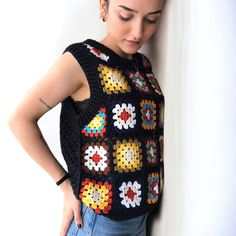 Casual Sleeveless Granny Square Top, Casual Hand Knitted Knit Vest, Crochet Knit Sleeveless Vest, Casual Hand Knitted Vest, Casual Crochet Cotton Vest, Casual Crochet Sleeveless Vest, Multicolor Sleeveless Granny Square Top, Sleeveless Crochet Cotton Sweater Vest, Casual Cotton Crochet Vest