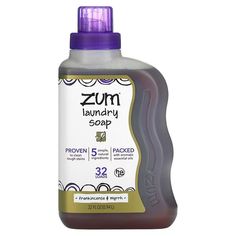 a bottle of zum laundry soap on a white background