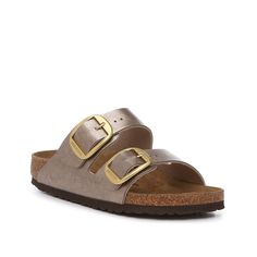 Birkenstock-Arizona Sandal - Women's Upgrade your casual footwear with the Arizona sandals from Birkenstock. The easy-to-wear slip-on design and contoured footbed make this a comfortable and supportive option for everyday wear. Complete with oversize metallic buckles on both straps for a fun accent. Gold Casual Slip-on Slides, Gold Buckle Closure Slip-on Sandals, Gold Slip-on Sandals With Buckle Closure, Gold Slides With Leather Footbed, Gold Slip-on Slides With Leather Footbed, Gold Leather Footbed Slides, Casual Gold Slides With Buckle Closure, Casual Gold Sandals With Buckle Closure, Casual Gold Mules With Cushioned Footbed