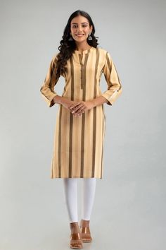 Looking for a stylish and comfortable addition to your wardrobe? Our Women's Plus Size Khadi Cotton Straight Stripe Kurti is perfect for you! Made from sustainable and breathable khadi cotton, this kurti is comfortable enough to wear all day long. The horizontal stripes and straight fit silhouette make it a versatile choice for any occasion, whether you're dressing up or going for a casual look. This kurti is available in a range of sizes from M to 7XL, ensuring that all women can find the perfect fit. The yellow color is perfect for adding a pop of color to your outfit, and the striped pattern adds interest and visual appeal. Not only is this kurti stylish, but it's also sustainable and environmentally friendly. Khadi cotton is a traditional fabric that is hand-spun and hand-woven, making Casual Long Sleeve Beige Kurta, Casual Beige Long Sleeve Kurta, Beige Long Sleeve Casual Kurta, Casual Straight Kurta For Work, Oversize Dress, Kurta For Women, Traditional Fabric, Oversized Dress, Women Plus Size