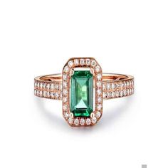 A perfect handmade Bestselling 1.50 Carat Emerald and Diamond Halo Engagement Ring in 14k Rose Gold affordable emerald and diamond engagement ring. The beautiful women's engagement ring is a perfect designer gemstone ring, handmade and customized to perfection. The glittering and shinning perfect emerald gemstone ring is sure to please her at very first sight.ABOUT THIS RING:-Gold Metal: 14K Rose GoldCenter Gemstone:-Beautiful Emerald cut green emerald. The emerald is approx 7x5mm in size.Side S Affordable Ring, Emerald And Diamond Engagement Ring, Pave Setting Ring, Affordable Rings, Moissanite Engagement Ring Halo, Green Emerald Ring, Emerald Ring Gold, Engagement Rings Affordable, Emerald Diamond Ring