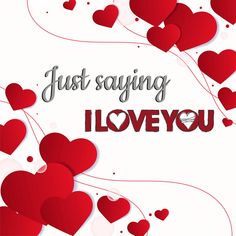 the words just saying i love you are surrounded by red hearts on a white background