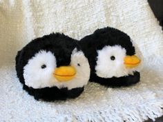 • One Size• Footbed measures 10.5"• Fits up to Women's size 10.5 / Men's 9You'll be marching like the penguins in these Fuzzy Penguin Slippers, complete with fluffy black and white fur and yellow beaks. Made with cushioned foam footbeds, velvety linings, and pillowy plush uppers. Fast Shipping TimesWe operate M-F, and will ship out your item out as soon as we receive payment. Most orders are shipped in less than a day. Orders placed on Saturday and Sunday will ship out Monday morning.Returns &am Cute Slippers Fluffy Animals, Penguin Slippers, Slippers Fluffy, Slippers Outfit, Fun Slippers, Trashy Outfits, Giant Animals, Fancy Heels, Christmas Slippers