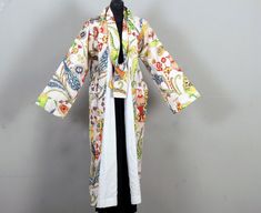 Large white kimono with bird patterns Long bathrobe digital printed cotton dressing gown Kimono, indoor clothing for men or women lined with plain white cotton Large side pockets and two belts: to tie in front or behind, geisha style or classic style Comfortable and elegant, warm and refined, chic and unique, it is ideal for getting out of bed or staying chic at home. Sent in a matching gift bag. 3 sizes offered here and customization on request size 1: length 130 cm width 140 cm size 2: length Long White Robe For Home, White Robe With Kimono Sleeves For Home, White Long Kimono For Loungewear, White Cotton Outerwear With Kimono Sleeves, White Long Robe For Spring, Long White Robe For Spring, Traditional White Robe With Kimono Sleeves, White Spring Kimono For Loungewear, Traditional White Kimono For Loungewear