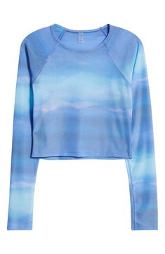 A mesmerizing print enlivens this gauzy mesh top cut in a cropped silhouette with sporty raglan sleeves. 17 1/2" length (size Medium) Jewel neck Long sleeves Sheer; base layer shown not included 93% polyester, 7% elastane Machine wash, line dry Made in the USA of imported fabric Yoga Prints, Mesh Crop Top, Color Wave, Beyond Yoga, Jewel Neck, Base Layer, Raglan Sleeve, Mesh Top, Crop Top