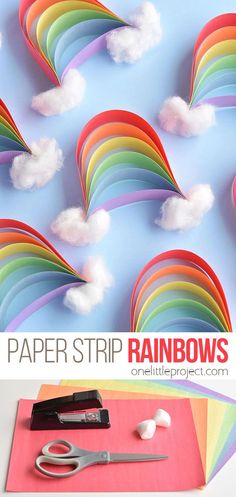 paper strip rainbows with scissors and other crafting supplies