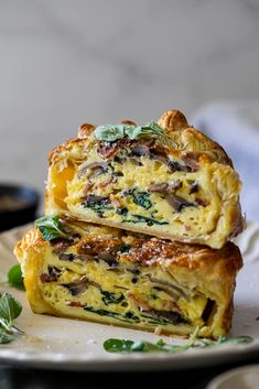 two pieces of quiche stacked on top of each other