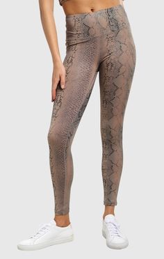 👉 Comment "Shop" to order this item 👈

Shimmer Snake Foil High Waisted Leggings 👇
This moisture wicking fabric has four way stretch and a high waist for comfort and support. Pair with the twist front athleisure crew neck. https://postdolphin.com/t/LUAOR Mommy Tummy, Activewear Print, Stylish Activewear, Graphic Leggings, Clothing Retail, Bootcut Pants, Active Leggings, Phone Pouch, High Rise Leggings