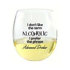 a close up of a wine glass on a white background with words written in it