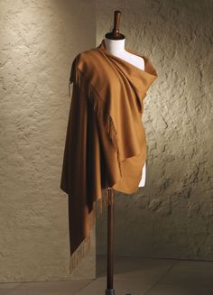 Yes, that really is the price. See why below... Our classic, lightweight 100% Vicuna Shawl. This beautiful shawl has a subtle diamond shaped pattern. This 100% Vicuna Shawl is made of the finest animal fiber in the world. Luxurious Vicuna is extremely light, amazingly soft, and provides unrivaled warmth. The shawl comes in a wooden box and includes a CITES certificate proving the fiber came from government controlled shearing operations on live animals. When we visited the mills the Vicuna proce Alpaca Shawl, Walls Room, Alpaca Wool, Shape Patterns, Mens Coats, Alpaca, Orange Color, High Low Dress, One Shoulder Dress