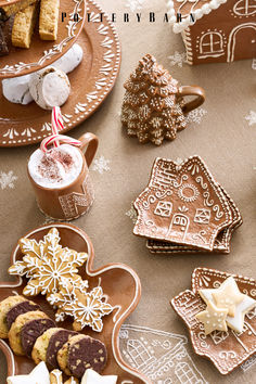 a table topped with lots of different types of cookies