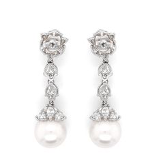 Hanging pearl dangle earrings with round / marquise combination cut natural white diamonds 5.09 ct in total. Diamonds are in G-H Color Clarity VS. Pearls are freshwater and round ( top is 7.5 mm and bottom is 13.8 mm ). Classic back stud. Length: 4.5 cm Width: 1.3 cm Weight: 18.8 g Elegant White Marquise Bridal Earrings, Exquisite Diamond Bridal Earrings With Pearl Drop, Luxury Pearl Drop Dangle Diamond Earrings, White Gold Diamond Bridal Earrings With Pearl Drop, Diamond White Pearl Drop Bridal Earrings, Diamond White Bridal Earrings With Pearl Drop, Diamond Dangle Bridal Earrings With Pearl Drop, Diamond Pearl Dangle Earrings With Elegant Design, Wedding Diamond Earrings With Pearl Drop