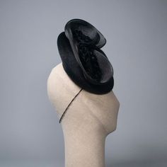 Festive fascinator in luxe black melusine-finish fur felt with braided velvet and crinoline trims. Materials: Ethically sourced fur felt, Velvet, Crinoline, Millinery Wire, Grosgrain Style: Fascinator Attachment: Elastic Measurements: 9 in diameter base Hat Box: 10 in How to Wear: Worn on right side of head Ready to Ship. This piece is available in custom colors.Please read FAQ's & Shop Policies before purchasing.Any other questions? Click here to contact me. Each Milli Starr piece is meticulous Black Fitted Fascinator For Evening, Elegant Black Feather Trim Costume Hat, Fitted Black Fascinator For Evening, Elegant Black Costume Hat With Feather Trim, Fitted Black Fascinator With Feather Trim, Black Mini Hat With Feather Trim For Royal Ascot, Fitted Black Headpiece For Evening, Black Fitted Fascinator With Structured Crown, Evening Fascinator With Feather Trim