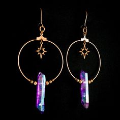 These iridescent purple quartz crystal earrings are the perfect celestial gift idea. Each antique copper hoop earring has a genuine stone hanging beneath an art deco starburst charm and surrounded by dainty copper beads. These earrings are a bold conversation starter. They are a bit heavy due to the fact that these are real quartz crystals, but the ultra light hoop and charms help offset the weight. A gorgeous oddity jewelry set. -Genuine iridescent purple quartz crystals -Art deco starburst cha Celestial-style Pierced Rose Gold Jewelry, Celestial Style Pierced Rose Gold Jewelry, Celestial Rose Gold Pierced Jewelry, Handmade Iridescent Metal Jewelry, Mystical Ear Wire For Jewelry Making, Iridescent Adjustable Mystical Jewelry, Mystical Style Ear Wire For Jewelry Making, Iridescent Metal Dangle Jewelry, Iridescent Metal Jewelry For Jewelry Making