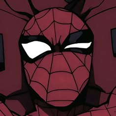 a close up of a spider man with his eyes closed