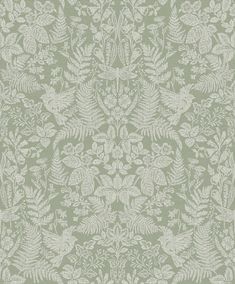 a green and white wallpaper with leaves