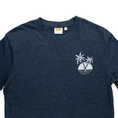 Wear a T-Shirt that Combines Style and Island Cool This great looking tee is made for those who crave adventure and appreciate contemporary cool. Two simple yet iconic palms grace the shirt’s front. A 2-tone large graphic covers the back. With a design that transports you to swaying palm trees and endless beaches, it's more than a shirt– it's an escape. Get ready to turn heads, because when you wear this tee, everyone will ask you where you got it. It’ll be our secret. Or not. 100% Cotton Black Pineapple Christmas, Polynesian Cultural Center, Abalone Ring, Hula Skirt, Ukulele Accessories, Honey Cookies, Music Ornaments, Abalone Earrings, Real Flower Jewelry