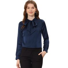 This casual formal shirt features a bowtie neck. Wear it with your favorite skirts or pants for an elegant outfit. This classic solid satin blouse is an elegant take on a wardrobe, adding a simple addition to your blouse collection. With soft satin fabric, this blouse will be the perfect choice for all kinds of occasions. The bow-tie neck is elegant and makes your neckline look more slender. Affordable Classic Blouse With Lapel Collar, Cheap Office Blouse With Lapel Collar, Classic Office Wear Blouse At Affordable Price, Affordable Classic Office Wear Blouse, Cheap Navy Blouse For Workwear, Cheap Blue Blouse For Workwear, Satin Bow Blouse Pencil Skirts, Elegant Semi-formal Tie Neck Blouse, Elegant Tie Neck Blouse For Semi-formal Events