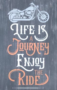 a sign that says life is a journey enjoy the ride on a motorbike