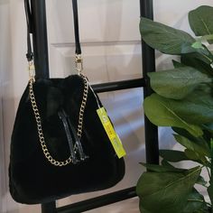 Gianni Bini Bag With Adaptable Two-Way Straps, Allowing For Crossbody Wear Or Transforming Into A Shoulder Bag By Detaching The Long Strap. The Elegant Gold Chain Serves Both As A Strap And A Stylish Accent. Interior Features Two Open Pockets And A Zippered Compartment For Organization. This Bucket Bag Is Secured With A Drawstring Closure Complemented By A Magnetic Snap For Added Convenience. Purse Is Brand New With Original Tags. Smoke-Free Household. Trendy Hobo Bag With Adjustable Strap For Party, Chic Bags With Long Strap, Elegant Hobo Bag With Adjustable Strap For Parties, Chic Evening Shoulder Bag With Long Strap, Trendy Evening Shoulder Bag For Winter, Chic Evening Shoulder Bag For Winter, Chic Fall Bags For Night Out, Elegant Party Hobo Bag With Adjustable Strap, Chic Evening Bucket Bag With Zipper Closure