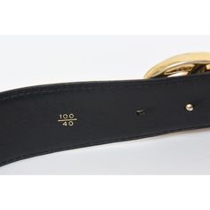 This 1980's Gucci black leather logo wide vintage belt is Italian and has the large gold plated GG's. It says 100/40 on the inside back. The GG's measure 2.5" W x 2.5" H as they are intertwined. The black belt strap is 44" L or wide x 1.85" H or deep. With the GG's logo included the entire belt width is 46.25" W or long. Says Made in Italy by Gucci. There are 3 original belt holes. Gucci Designer Belt Buckles For Business, Elegant Black Belt Buckle With Gold-tone Logo, Gold Leather Belt Buckle With Logo Plaque, Gold Leather Belt Buckle With Metal Logo, Designer Formal Belt Buckles With Gold-tone Hardware, Designer Formal Belt With Gold-tone Logo Plaque, Designer Belt Buckles With Gold-tone Hardware For Formal Wear, Designer Gold-tone Belt Buckles For Formal Wear, Gold Belt With Logo Plaque For Formal Occasions