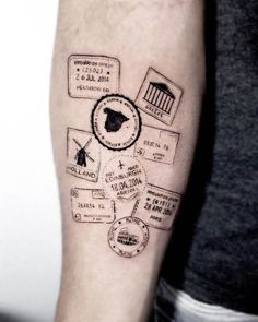 a person with a tattoo on their arm has a passport stamp design on his forearm