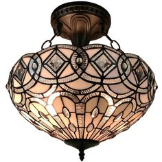 a light fixture with stained glass shades on it