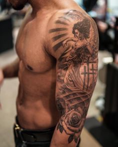 a man with a tattoo on his arm