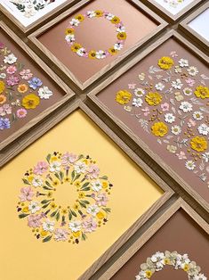 six framed pictures with flowers on them in different colors and sizes, all arranged together