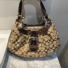 Selling A Large Tan Coach Monogram Shoulder Tote In Very Good Condition $125 Coach Monogram, Bags Coach, Cute Bags, Louis Vuitton Speedy Bag, Shoulder Tote, Womens Tote Bags, Coach Bags, Top Handle Bag, Louis Vuitton