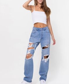 These baggy jeans are a fun fit to try out the 90s trend. They are heavily distressed with a straight leg fit. Mid rise. 100% Cotton. Inseam: 31, Rise: 12. Model is wearing a size 3. Runs small. We recommend sizing up. Basic Streetwear, 90s Trends, High Heel Sneakers, Kawaii Fashion Outfits, Baggy Jeans, Sneaker Heels, Kawaii Fashion, Mid Rise, Levi Jeans