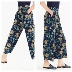 J. Crew Wide Leg Floral Cropped Pants Sz 10 New With Tags Onseam Front Pockets Polyester Elastic Waistband At Back Measured Flat 1.5” Wide Waistband 15.5”-18” Waist 12” Rise 23.5” Inseam 35” Length Navy Blue Background With Yellow And Green Floral Print Easy Through Hip And Thigh With A Cropped Wide Leg Pull On ** Get $10 In Posh Credit By Entering My Code Kalifreshness When You Sign Up For A New Poshmark Account** Blue Floral Print Bottoms For Workwear, Blue Floral Print Pants For Work, Workwear Floral Print Tapered Leg Pants, Chic Floral Print Ankle-length Wide Leg Pants, Multicolor Floral High-waisted Wide Leg Pants, Floral Print Non-stretch Wide-leg Pants, Stretch Wide-leg Floral Print Pants, Floral Print Rayon Wide-leg Pants, Wide Leg Cropped Pants