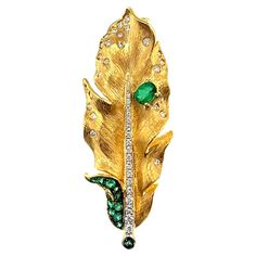 18K Yellow Gold Emerald Leaf Brooch & Pendant with Diamonds 1 Emerald - 0.20 CT 43 Diamonds - 0.43 CT 13 Emeralds - 0.175 CT 18K Yellow Gold - 6.57 GM Pendant & Brooch A precious gift for Him, Her or Yourself Luxury Yellow Gold Pendant Brooch, Luxury Yellow Gold Gemstone Brooch, Luxury Yellow Gold Gemstone Brooches, Luxury Yellow Gold Brooches With Gemstones, Luxury Green Pendant Brooch, Gold Diamond Brooch With Gemstone, Jewelry Design Inspiration, Precious Gift, Dragonfly Pendant