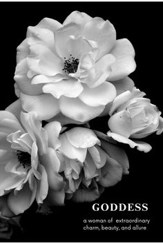 black and white photograph of flowers with the words goddess written on it's side