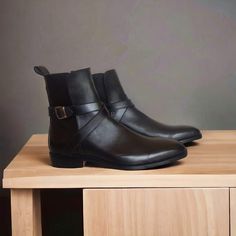 Title: Handmade New Fashion Men's Black Leather Side Buckle Strap Ankle High Chelsea Formal Boot Description: We are very professional in our manufacturing Products. Our Team includes Five Levels of Experts; 1. Frame maker 2. Upper Designer 3. Upper Maker 4. Sole Maker 5. Color Master Our 90% work is Handmade and 10% is Machine Work. We covers all categories of Shoes Styles including Glued or Semantic style, Blake stitched style, Good year Welted style, Double Welted Sole & Triple Welted styles. Leather Moto Boots With Buckle Closure For Business, Formal Leather Chelsea Boots With Buckle Closure, Leather Chelsea Boots With Buckle For Formal Occasions, Black Moto Boots With Buckle Closure For Business, Machine Work, Chelsea Ankle Boots, Mens Black Leather, Buffalo Leather, Mens Shoes Boots