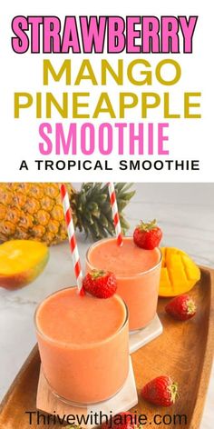 two smoothies with strawberries and pineapple on the side