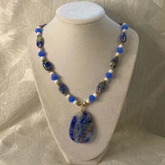 This One Of Kind Piece Features Natural Sodalite Stones Along With Small White Howlite And Periwinkle Colored Crystals. The Piece Is Finished With A Pewter Toggle Clasp And It Measures 22” Long. It Gives Denim Vibes And Is The Perfect Length To Wear With Any Top! Black Gold Necklace, Sodalite Necklace, Stone Statement Necklace, Rhinestone Statement Necklace, Leather Corded Necklace, Layered Necklace Set, Jewelry Blue, White Howlite, Silver Snake Chain