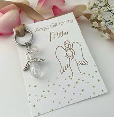 A beautiful handmade beaded sparkly crystal Angel charm on a silver stainless steel keychain, a perfect personalised  meaningful, birthday, thank you or any occasion gift for a Mother.  Option to choose a real crystal healing protection charm which will be wire wrapped by hand and added to the keychain. Choose from the drop down menu from  Rose Quartz -  Trust , Love , Healing Amethyst -  Protection,  Clarity,  Calmness  Green Aventurine -  Strength,  Confidence,  Courage Carnelian -  Confidence Silver Keychain With Lobster Clasp, Silver Keychain With Lobster Clasp For Gift, Silver Keychain With Lobster Clasp As Gift, Personalized Silver Keychain For Personal Use, Silver Keychain For Gift, Personalized Silver Keychain Gift, Personalized Silver Keychain, Handmade Silver Keychain For Personal Use, White Keychain With Lobster Clasp For Gift