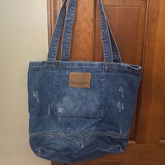 Distressed Denim Bag From American Eagle ~ Never Used. Everyday Distressed Denim Bag, Casual Medium Wash Cotton Shoulder Bag, Distressed Denim Shoulder Bag For Daily Use, Daily Use Distressed Denim Shoulder Bag, Denim Distressed Shoulder Bag For Daily Use, Everyday Distressed Denim Blue Bag, Medium Wash Denim Tote Bag, Dark Wash Cotton Casual Shoulder Bag, Casual Dark Wash Cotton Shoulder Bag