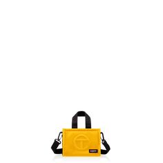 TELFAR’s iconic shopping bag in three sizes and a new circle bag, reworked in tactical nylon with Eastpak’s expertise and emphasis on utility. Telfar X Eastpak, Telfar Logo, The Afterparty, Yellow Sign, Circle Bag, Yellow Shop, Party Bag, Emphasis, Luxury Bags