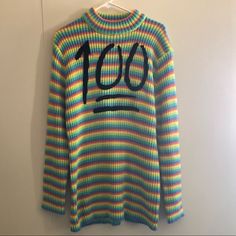 New Without Tag Nwot Rare Unif Pastel Rainbow 100 Mock Neck Stripe Sweater Knit Cardigan Sweatshirt Long Sleeve Shirt Tee Top Blouse Available In Size Xs And Size M They Look Identical. Talk About A Perfect Score. The 100 Sweater Is Made In A Rainbow Knit And Features Funnel Neck, Loose Fit, And "100" In Terry Cloth Appliqu At Front. Can Easily Be Worn As A Dress. Team It Up With Platforms And Knee-High Socks, Or Slide Sneakers And A Denim Jacket. By Unif. Very Cute! Perfect Score, Knee High Socks, Sweater Knit, Pastel Rainbow, Funnel Neck, Terry Cloth, High Socks, Stripe Sweater, Funnel