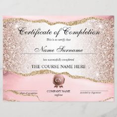 a pink certificate with gold glitters on it