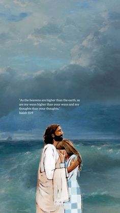 two people standing in front of the ocean with an image of jesus and mary on it