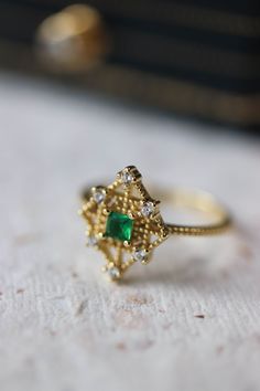 Fine Jewelry Emerald Ring With Intricate Design, Emerald Ring With Intricate Design, Heirloom Green Emerald Ring For Wedding, Heirloom Style Green Emerald Wedding Ring, Heirloom Green Emerald Wedding Ring, Emerald Jewelry With Intricate Design For Gift, Fine Jewelry Emerald Ring With Intricate Design For Wedding, Green Emerald Ring With Intricate Design For Gift, Gold Emerald Ring With Intricate Design For Gift