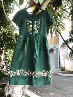 "\"Style is a way to say who you are without having to speak\"- Rachel Zoe. It's a green linen dress with hand embroidered flower. ❤ Item description: - A lovely dress with colourful embroidered flowers motifs. - Has lining, 2 hiden side pockets and a belt. - Very soft, skin friendly, breezy and comfortable. - Material: linen, hand embroidery, buttons. - Environmentally friendly. - This dress is very useful, go with any outfit, that can be used to go to school, go out, go shopping.    It is a perfect gift for yourself or your beloved.  ❤ Care instructions:      The best way to wash embroidery cloth is to put it in soapy water (with a mild detergent and cold water at 86 ºF/30oС) for 20 minutes. Try to not wash the item with other clothing that might cause damage, such as zippers, buttons or Embroidered Green Dress, Flowers Motifs, Embroidery Buttons, Hand Embroidered Dress, Green Linen Dress, Flower Embroidered Dress, Dark Green Dress, Go To School, Simple Embroidery