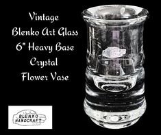 an old fashioned glass vase is shown with the words, vintage blendo art glass 6 heavy base crystal flower vase